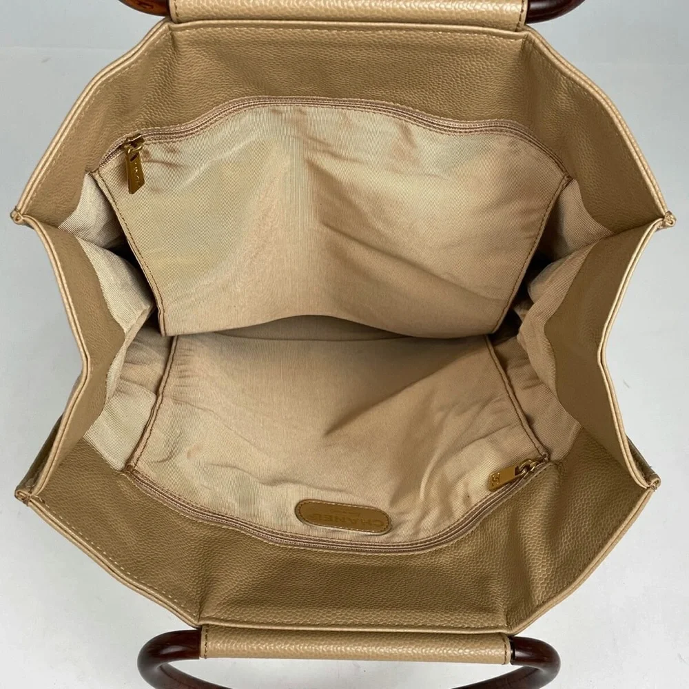 Authentic CHANEL beige caviar leather CC tortoise top handle satchel bag
